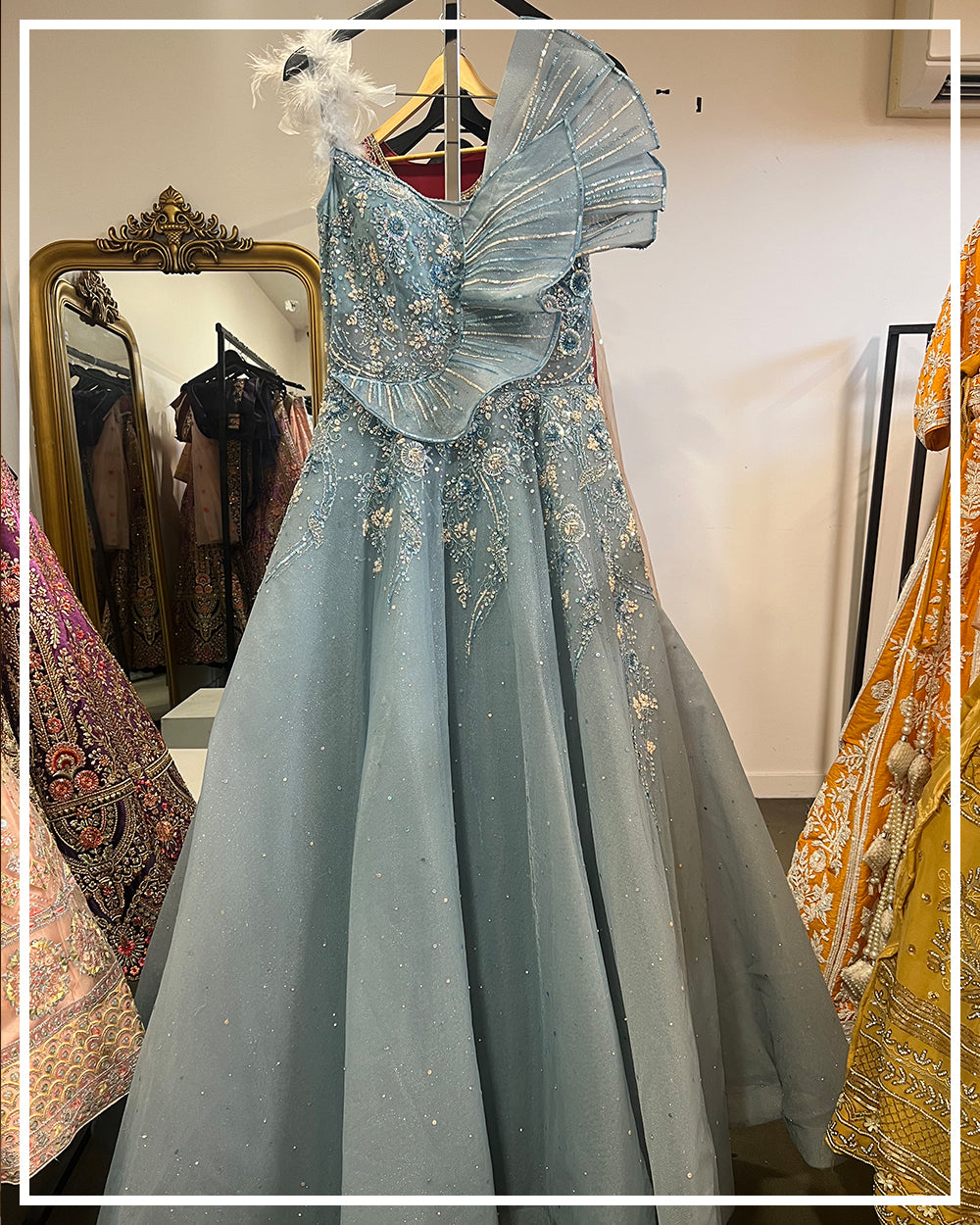 Ice Blue Embellished Ruffle Gown